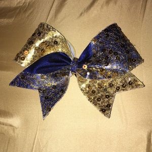 blue and gold sequence cheer bow